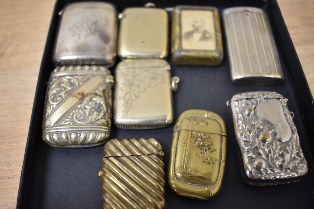 An assorted collection of silver, white metal, and other vesta cases and match holders, the - Image 2 of 2