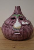 A 20th Century Continental novelty lidded dish, by ATN, in the form of a red onion, measuring 22cm