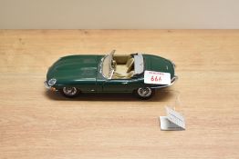 A Franklin Mint 1:24 scale Die-cast, 1961 Jaguar E-Type with tag and certificates, in card box