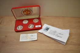 A Liberty Mint Four Fine Grade Silver .999 Medallion Set, Manchester United Treble Winners 1998-