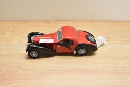 A 1989 Franklin Mint 1:24 scale Die-cast, 1936 Bugatti Atalante Type 57SC with tag and certificates,