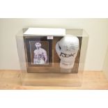A framed RBK Boxing Glove bearing siganature from Amir Khan with photograph and COA