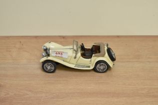 A 1986 Franklin Mint 1:24 scale Die-cast, 1938 Jaguar SS-100 having loose wheel, tag and
