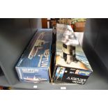 Two Model Kits, Revell 1:66 scale 04805 Apollo Saturn V and Graupner 2144 Neptun Cargo Motor Ship,