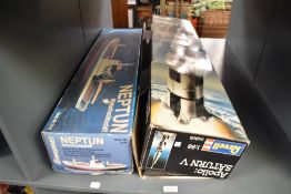 Two Model Kits, Revell 1:66 scale 04805 Apollo Saturn V and Graupner 2144 Neptun Cargo Motor Ship,