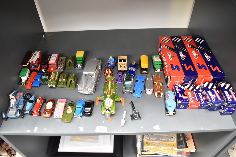 A shelf of playworn Die-casts including Dinky 351 UFO Interceptor with Rocket, Polistil Rolls Royce,