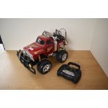 A Turbo Tec Radio Controlled Mad Bull 4x4 Off Road Truck, with controller and cables