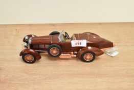 A Franklin Mint 1:24 scale Die-cast, 1924 Hispano-Suiza Tulipwood with tag and certificates, with