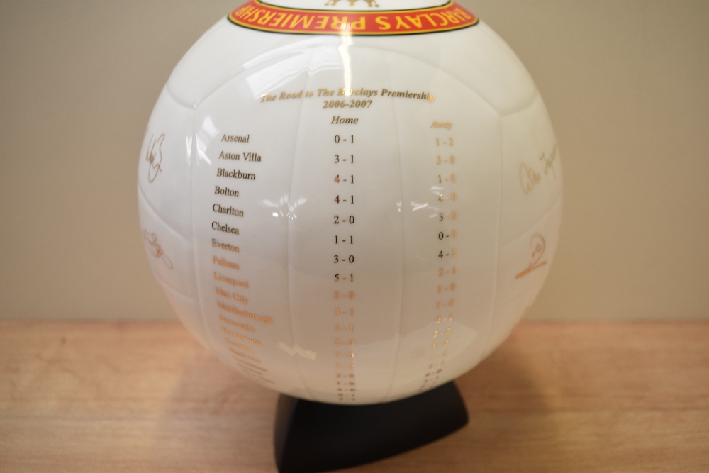 A Danbury Mint Manchester United Champions Trophy Glazed life sized Porcelain Football on display - Image 2 of 2