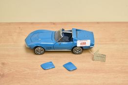A 1989 Franklin Mint 1:24 scale Die-cast, 1968 Corvette with tag and certificates, in card box