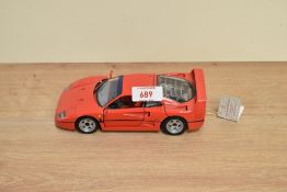 A 1991 Franklin Mint 1:24 scale Die-cast, 1989 Ferrari F40 with tag and certificates, in card box