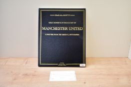 A Danbury Mint, Manchester United-The Collector's Edition, leather bound edition describing the