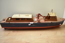 A woden radio controlled Tug Boat, named James Braidwood, length 85cm