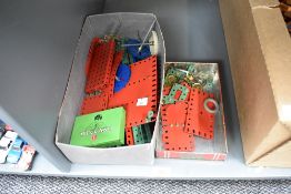 A small collection of Meccano including No5 tin box, Wheels etc