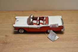 A Franklin Mint 1:24 scale Die-cast, 1957 Ford Skyliner with tag and certificates, in card box