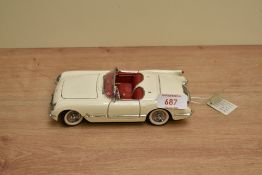 A 1989 Franklin Mint 1:24 scale Die-cast, 1953 Corvette with tag and certificates, in card box