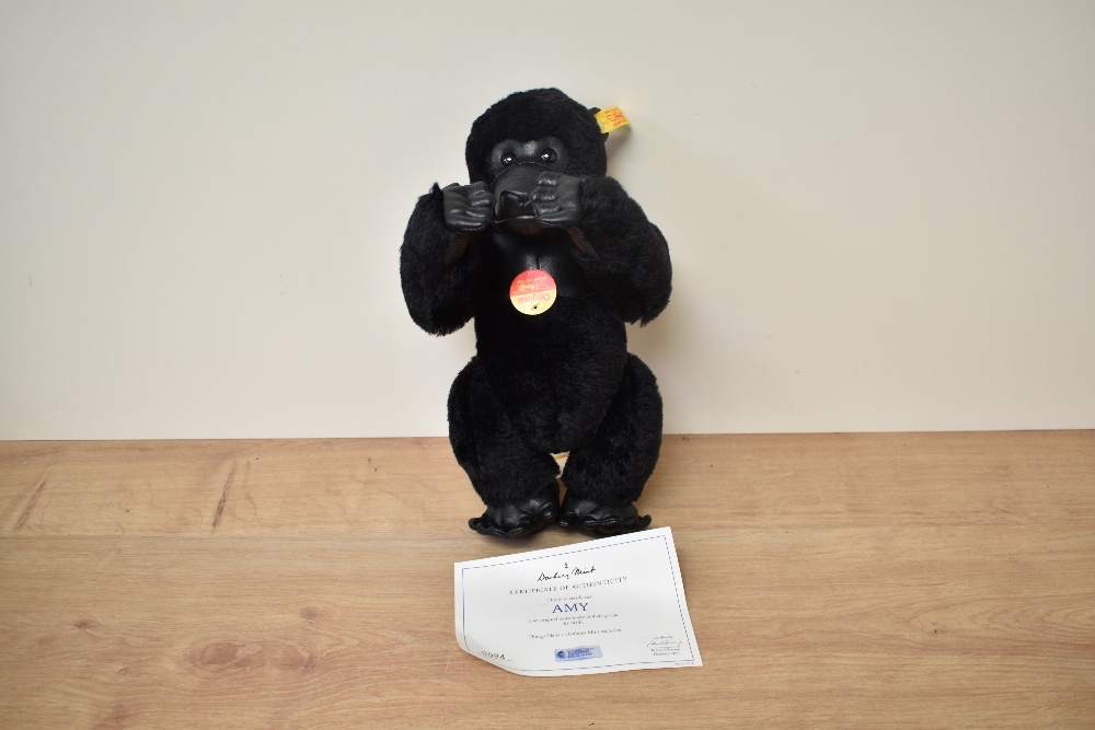 A modern Steiff Bear, 660634 Gorilla with yellow tag and button, in pull string bag