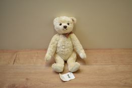 A modern Steiff Limited Edition Teddy Bear, 663697 2010 Year Bear with button, tag and card box