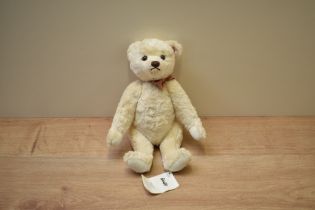 A modern Steiff Limited Edition Teddy Bear, 663697 2010 Year Bear with button, tag and card box