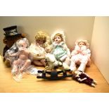 Four Ashton Drake Galleries Collectors Dolls, 92301, 93161, 96291 and 93161 along with a Hamilton