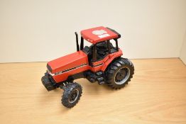 An ERTL die-cast, 7130 Case International Tractor, 70th Anniversary of CT Haytons of Kendal