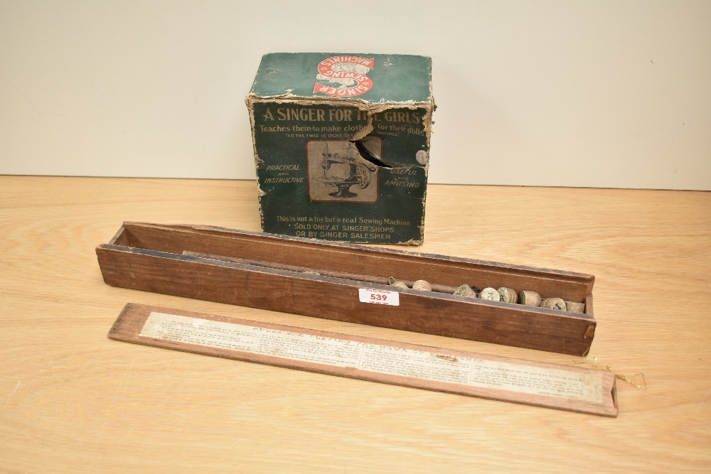 A Childs Singer Sewing Machine, Singer for the Girls in original box along with a Alfred Seeley