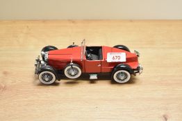 A 1988 Franklin Mint 1:24 scale Die-cast, 1928 Stutz Black Hawk Boat-tail Speedster with tag and