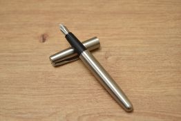 A Parker Frontier converter fill fountain pen in brushed steel having Parker nib.