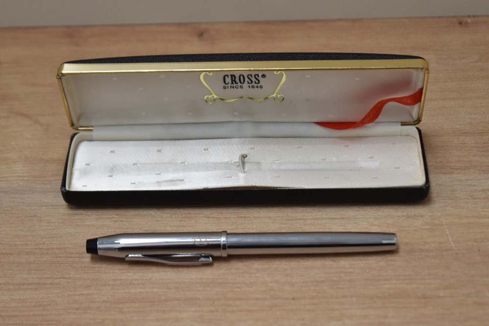 A boxed Cross Classic Century converter fill fountain pen in Lustrous Chrome having Cross M nib.