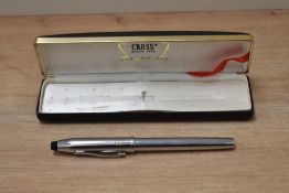 A boxed Cross Classic Century converter fill fountain pen in Lustrous Chrome having Cross M nib.