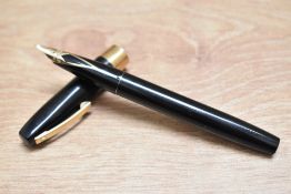 A Sheaffer Triumph Imperial cartridge fill fountain pen in black with broad band to the cap having