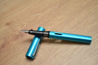A Lamy Al-Star cartridge fountain pen in pacific blue having Lamy M nib