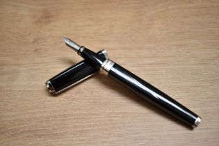 A boxed Waterman Exception Slim converter fill square shaped fountain pen in black with chrome