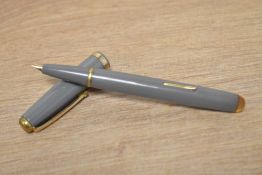 A Mentmore Diploma lever fill fountain pen in in grey having hooded cap