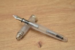 A boxed Platinum Century 3776 Nice Pur demonstrator converter fill transparent fountain pen having a