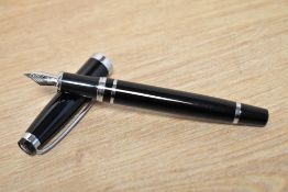 An FPR converter fill fountain pen in ambassador black with chrome trim having FPR nib
