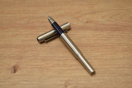 A boxed Parker 25 cartridge fill fountain pen in steel.