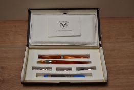 A Visconti Art of Writing Calligraphy boxed set in orange.