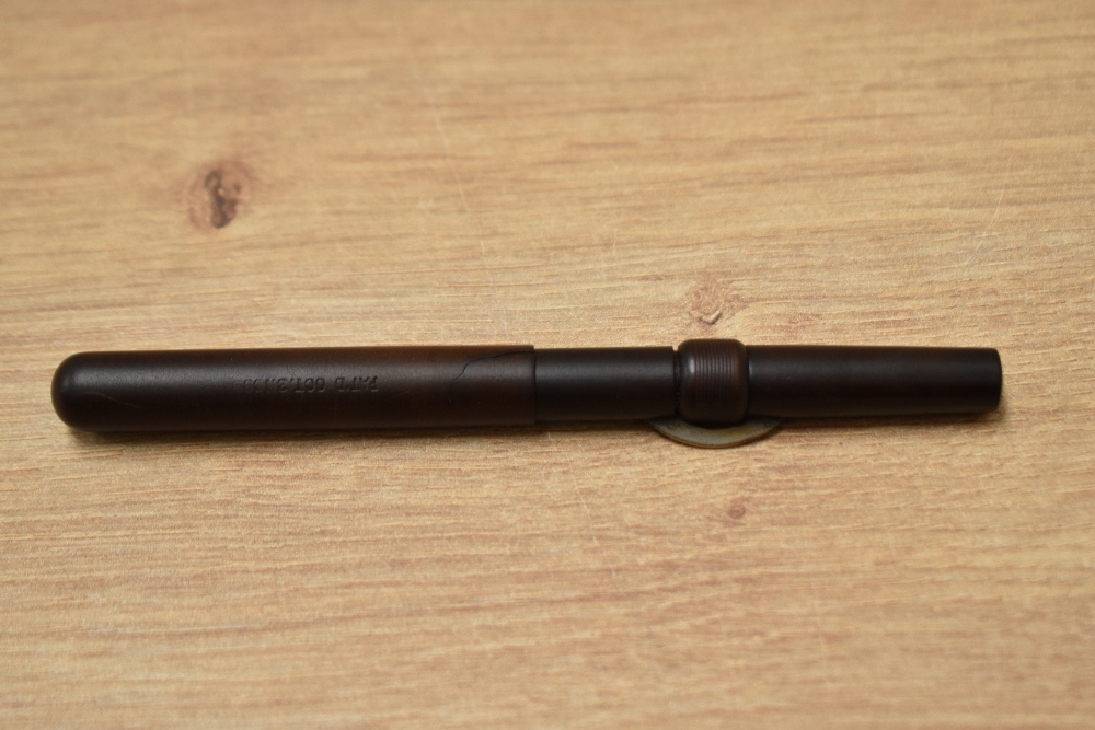 A Conklin crescent fill fountain pen in BHR having Meteor F 18ct No.10 nib. Crack to base of cap. - Image 3 of 3