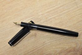 A Bohler piston fill fountain pen in black having Bock 14k 585 nib