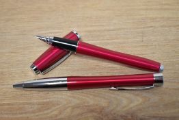 A Parker Urban converter fill fountain pen and ballpoint pen set in Vibrant Magenta with chrome