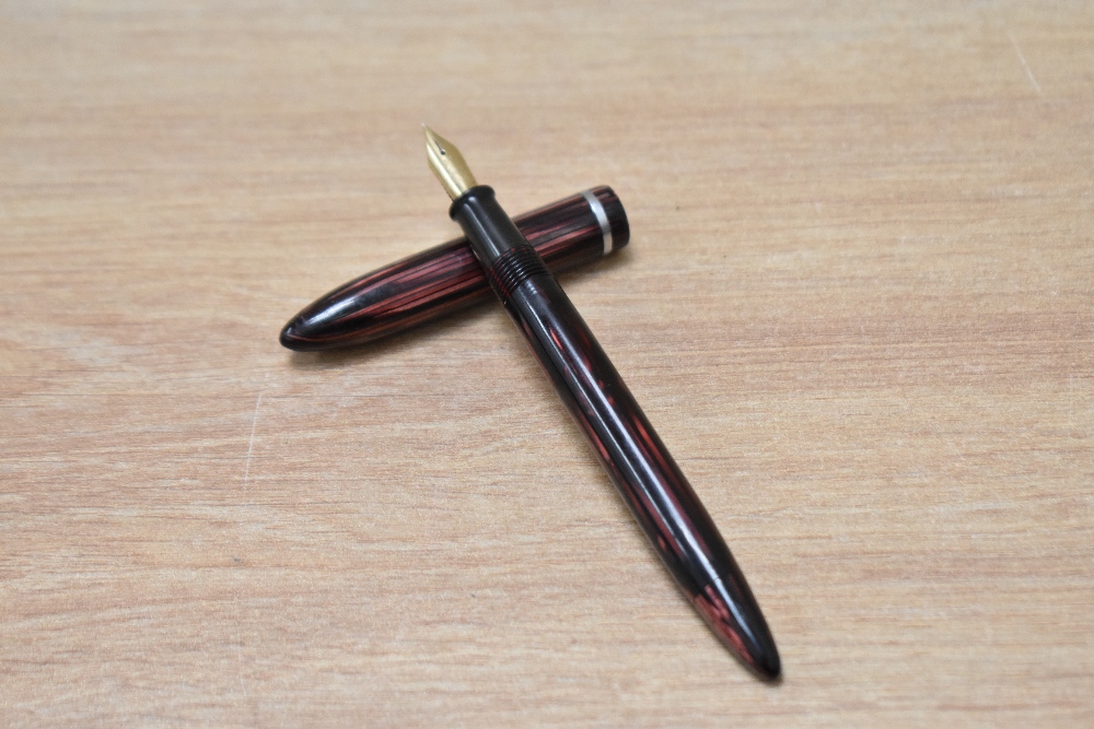A Sheaffer Lifetime Balance junior plunger fill fountain pen in burgundy striated with single band