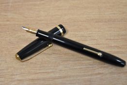 A Conway Stewart 12 lever fill fountain pen in black having Conway Stewart 14CT Gold 3N nib