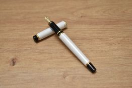 A boxed Pilot Grance converter fill fountain pen in white and black with gold trim having Pilot