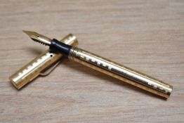 A Wahl leverfill fountain pen in gold Greek key design with Wahl 4 14k nib. Engraved
