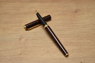 A boxed Parker 95 in brown lacque having Parker nib