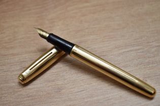 A boxed Sheaffer Prelude 368 converter fill gold plated having Sheaffer M nib. Small amount of