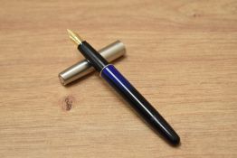A Parker Frontier cartridge fill fountain pen in blue with steel cap having parker nib.