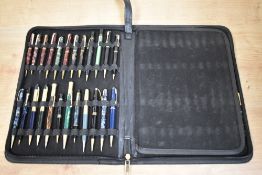 A Folder of 48 propelling pencils including Conway Stewart, Burnham, parker, eversharp, Eagle,
