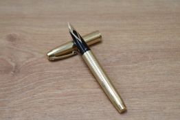 A Sheaffer Imperial 777 aerometric fill fountain pen in gold fill having Sheaffer 14K 585 nib